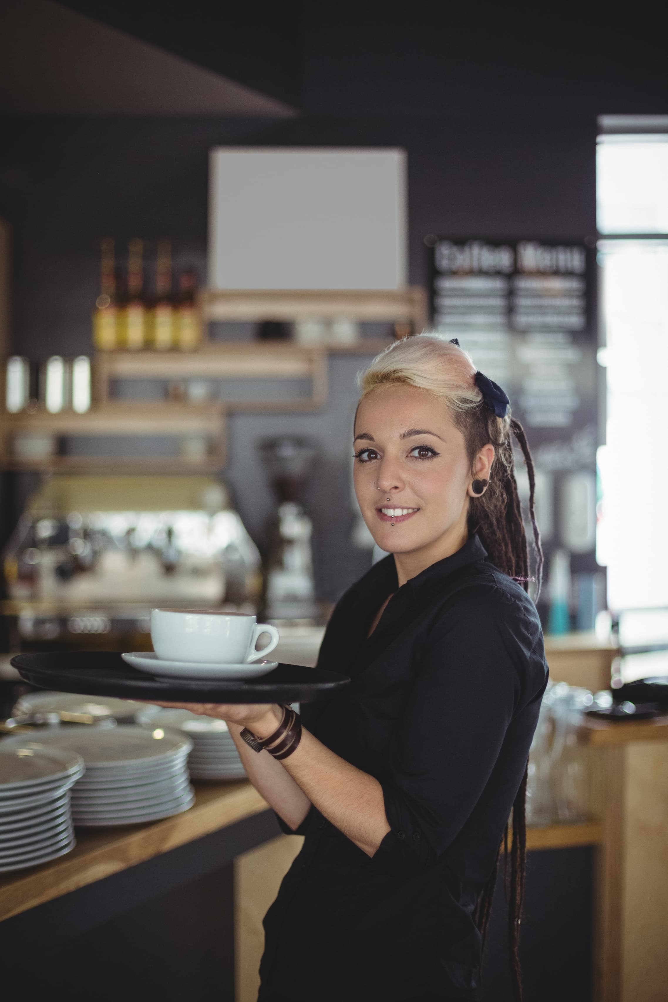 Waitress holding coffee
